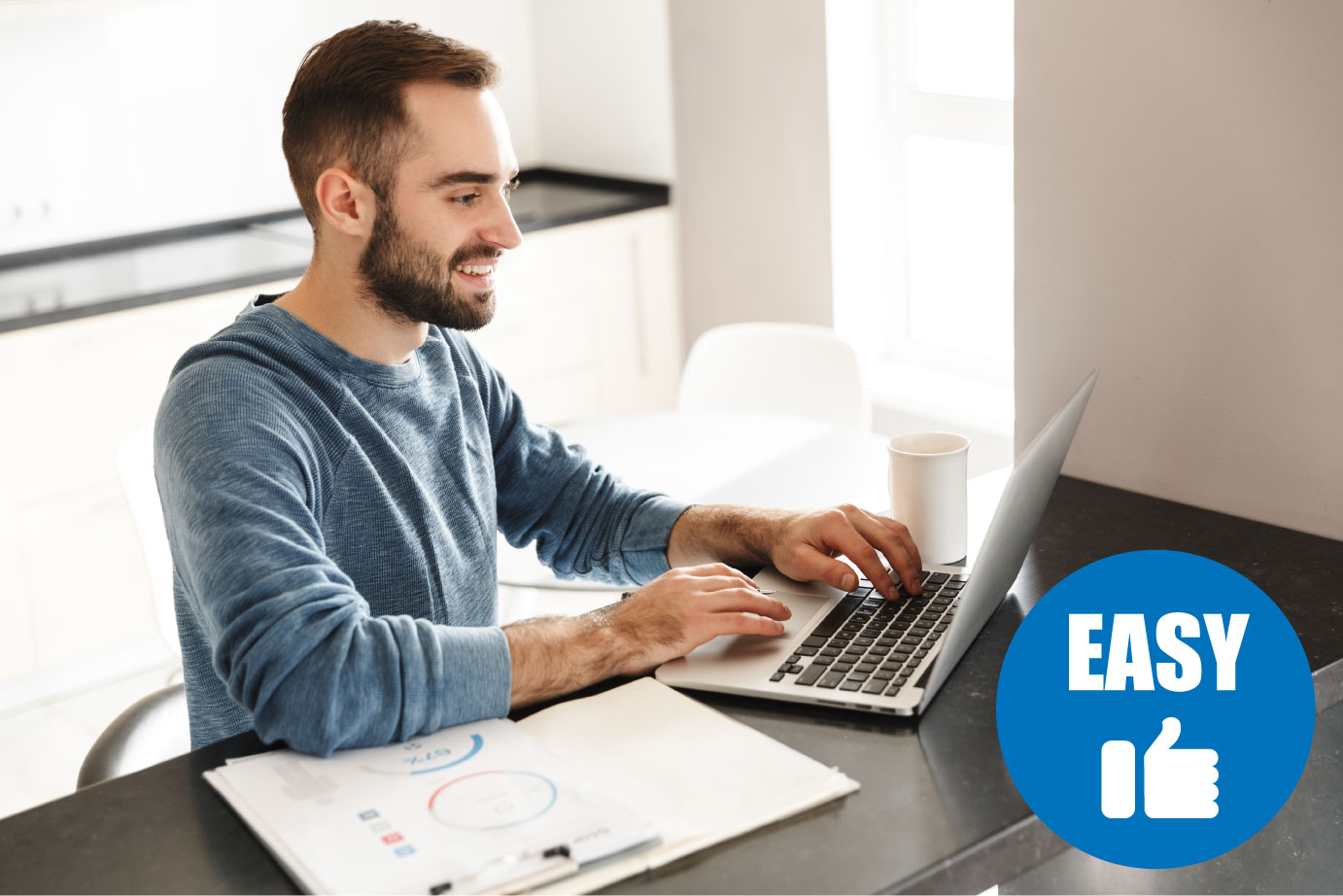 Man with beard browsing on computer and a blue round icon with easy and a thumbs up 